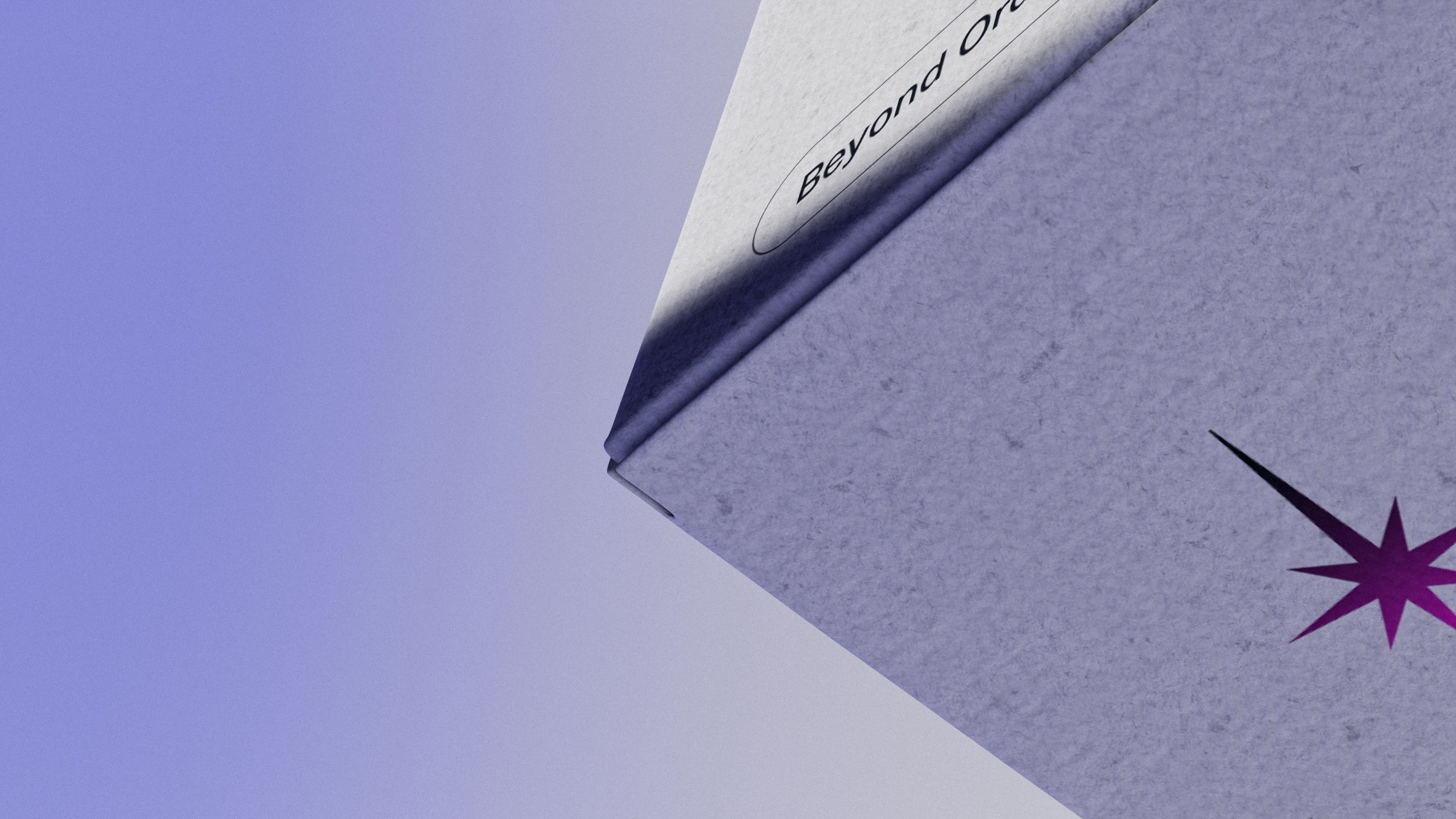 A close-up, angled view of a minimalist product box with a textured, light gray surface. The corner of the box is prominently displayed against a soft purple gradient background.